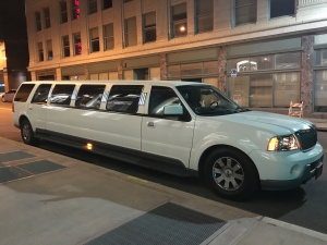 Outside the White SUV Limousine (View 3)