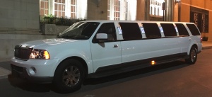 Outside the White SUV Limousine (View 2)