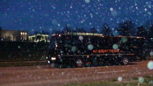 Black VIP Party Bus parked in front of the Nelson Art Gallery