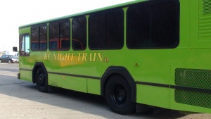 Green Party Bus as seen from the rear on the driver’s side
